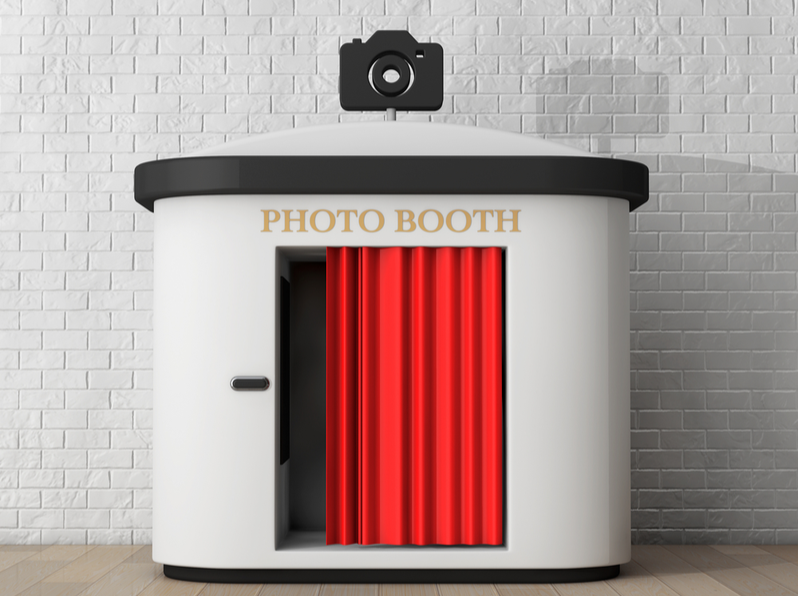 Photo Booth in front of brick wall